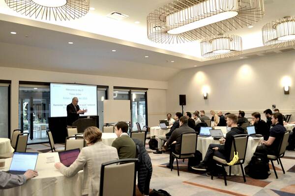 Professor Pat Flynn talking to students during the January 2024 Immersion.