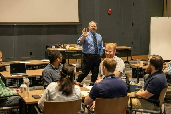 Director Woodard teaching at August Orientation.
